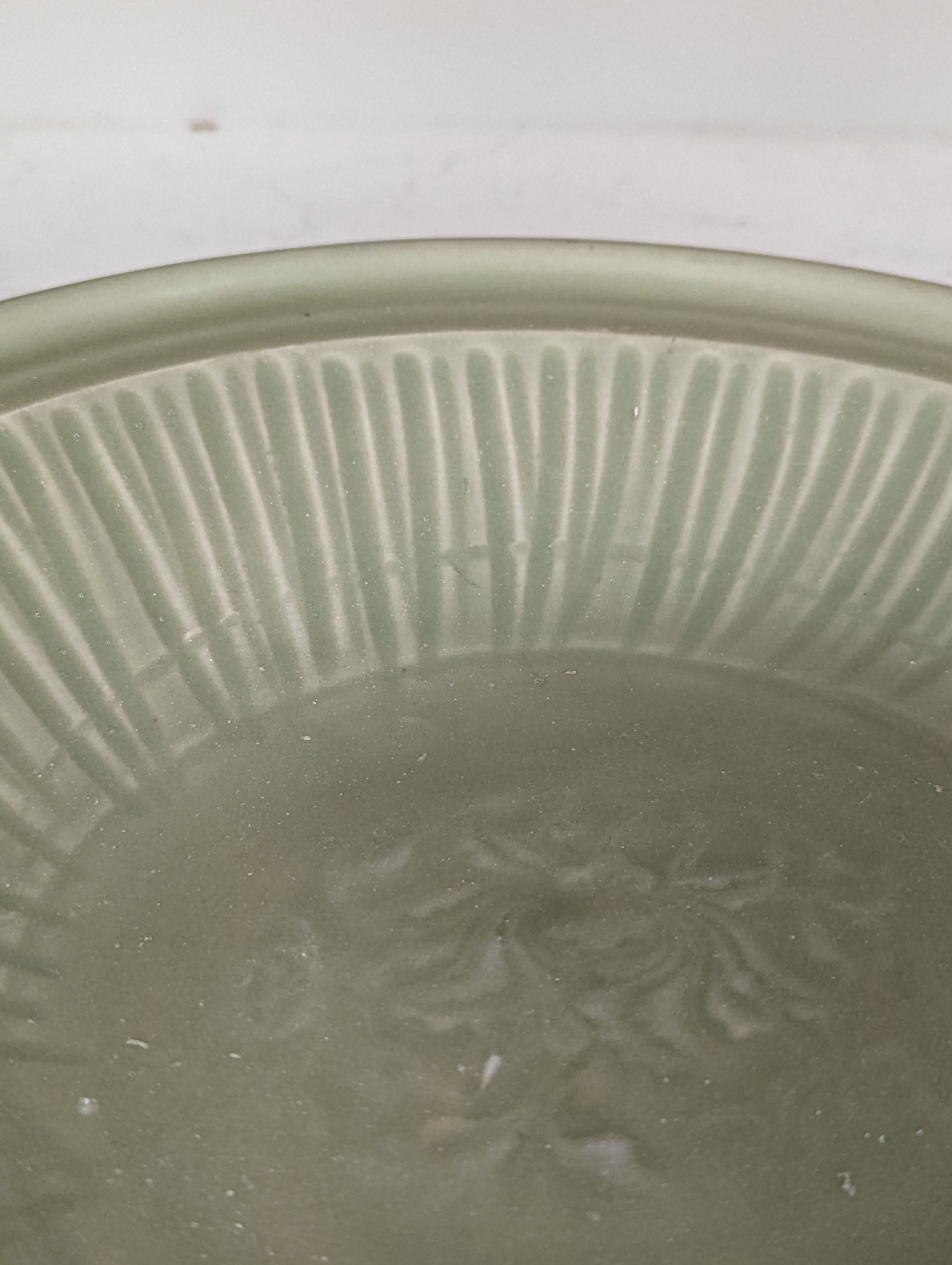 A Chinese Longquan celadon dish, 14th/15th century - 29cm wide